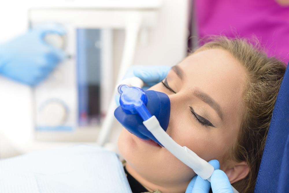 woman wearing sedation dentistry device | sedation dentist cookeville tn