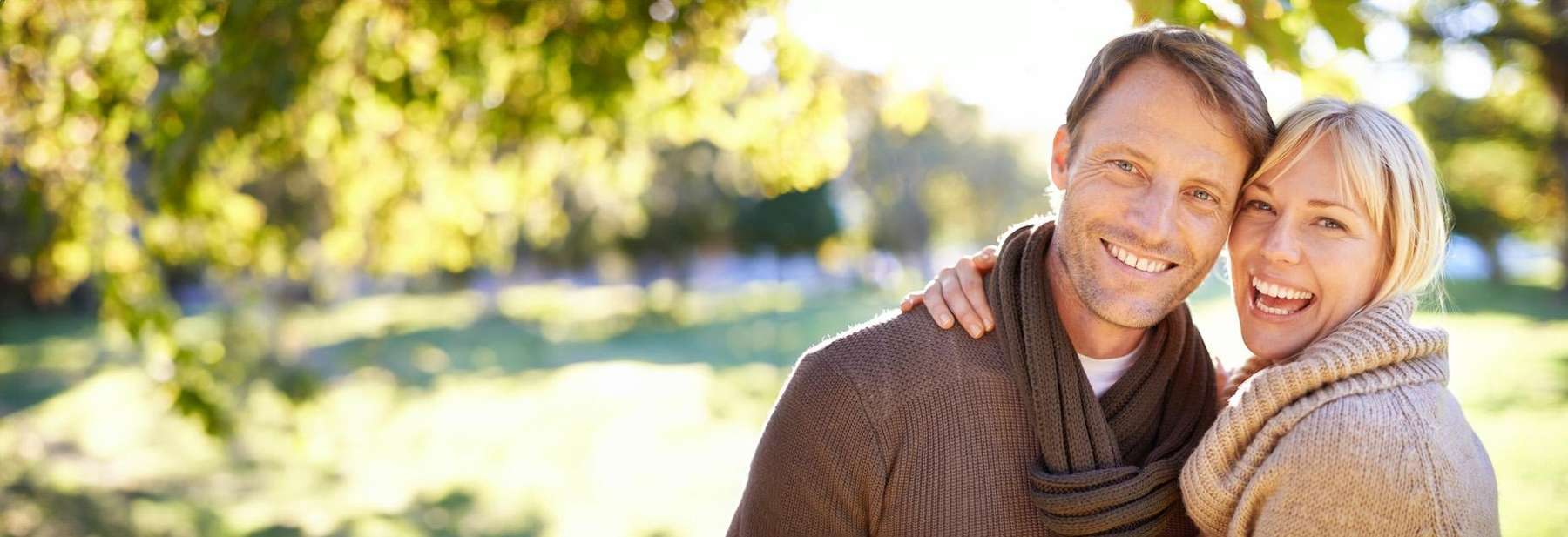 couple smiling outside | dentist cookeville tennessee