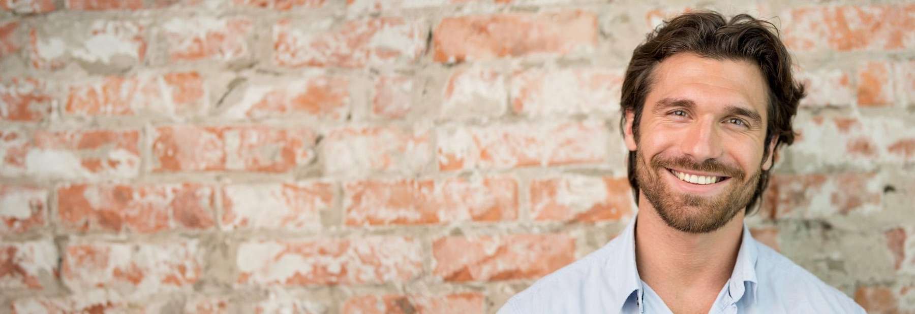 man with beard smiling | dentist cookeville tn