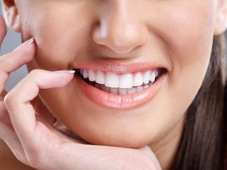 woman with bright smile | cosmetic dentist cookeville tn