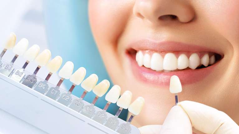 patient picking tooth whitening color | dentist cookeville tn