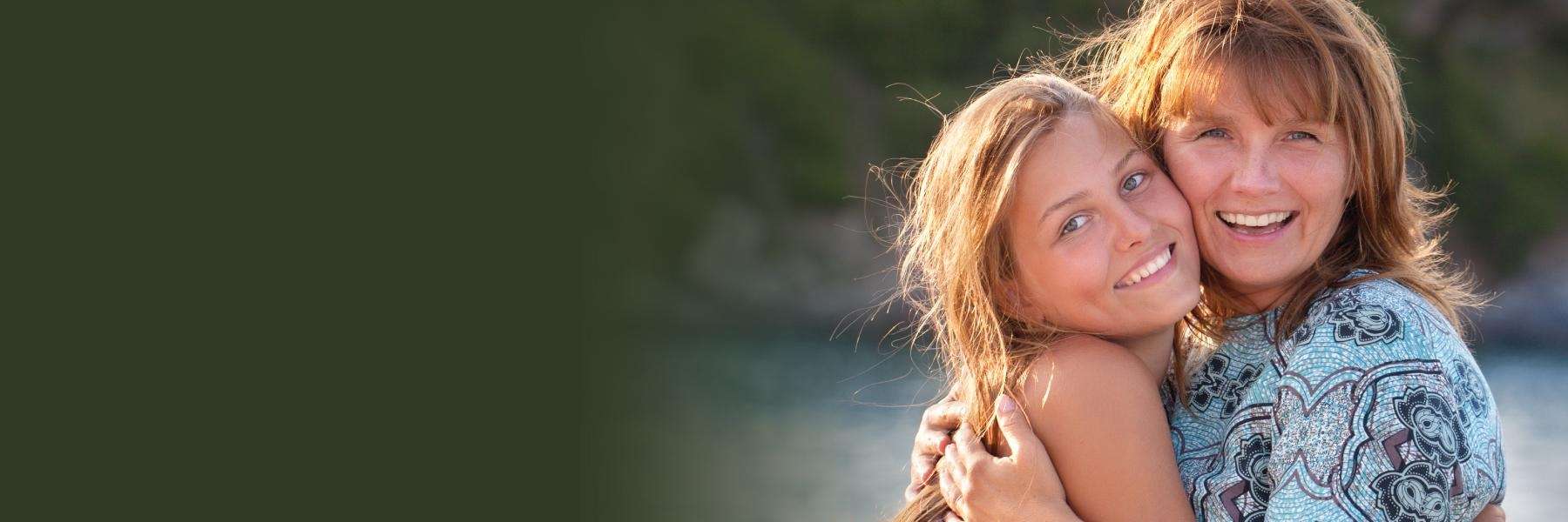 mother and daughter hugging | general dentistry cookeville tn