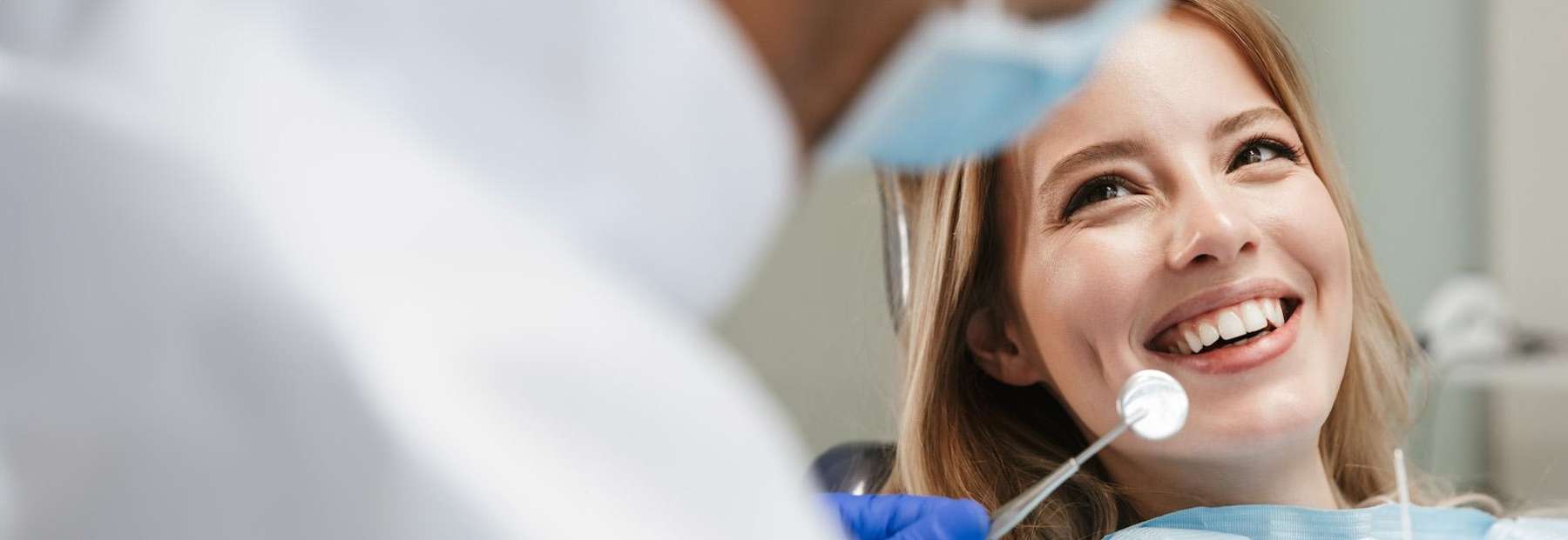 woman in dentist exam chair | sedation dentistry cookeville tn